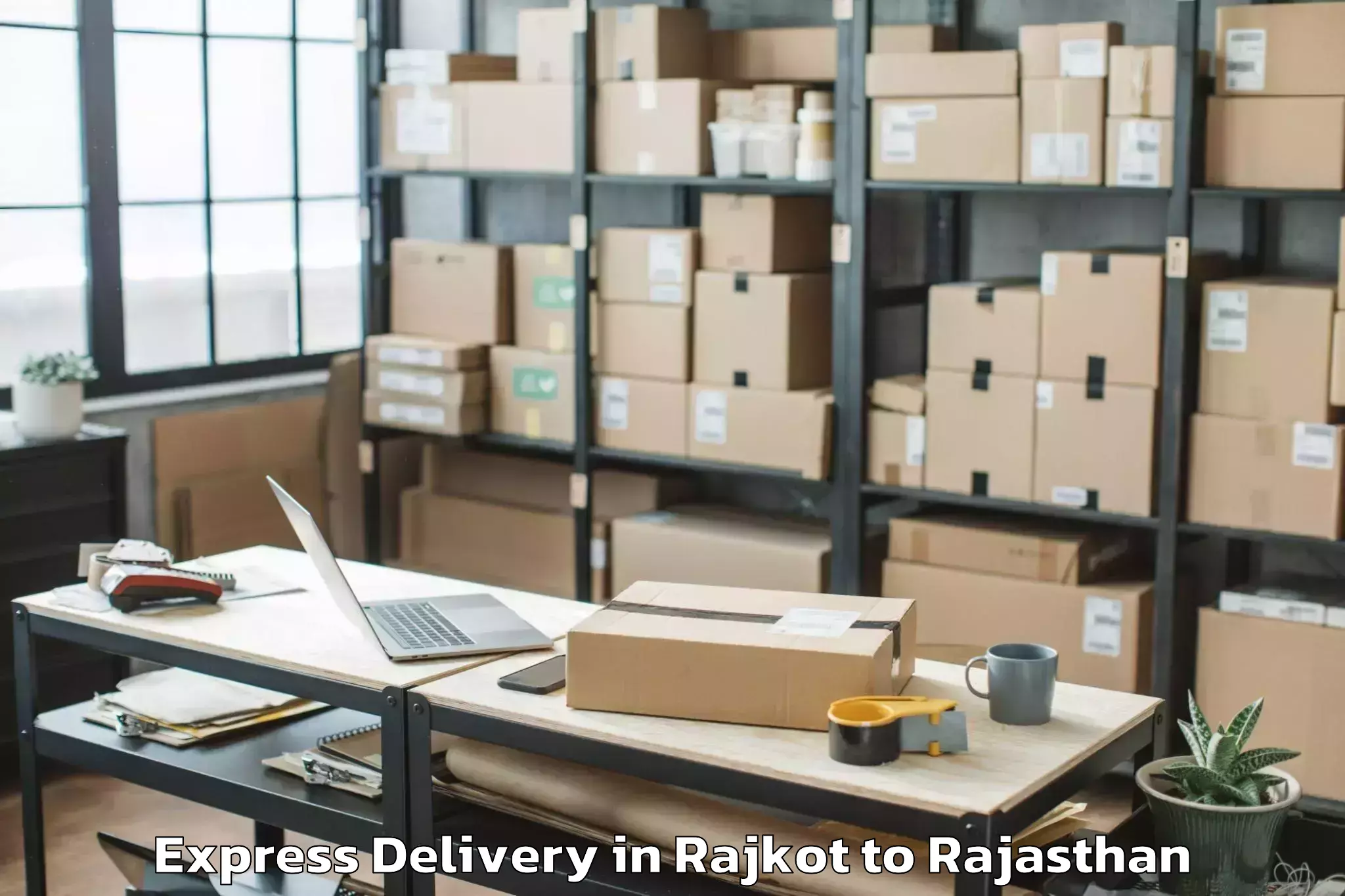 Book Rajkot to Hindaun Express Delivery